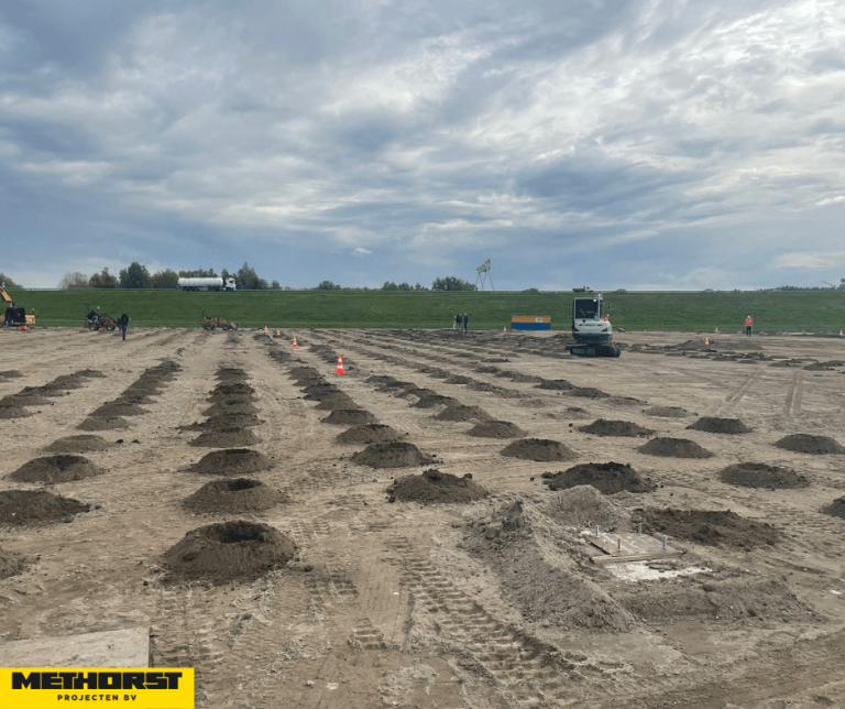 Boorafval wegzuigen bij heipaalkoppen